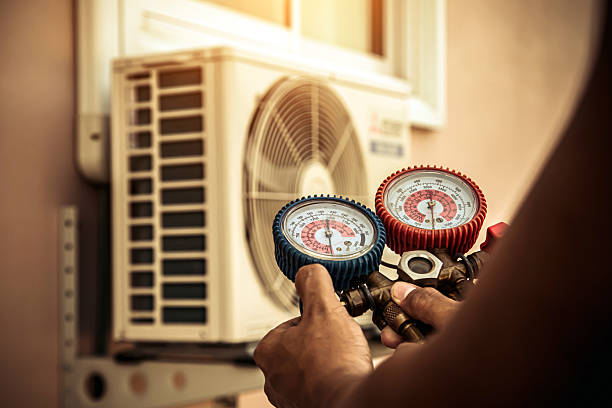 Professional Air Conditioning Service technician working in Pineland, FL